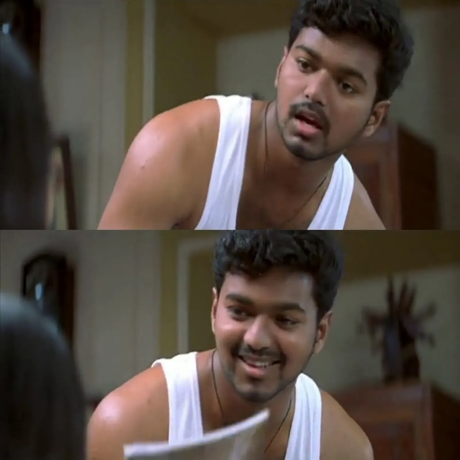 Vijay smiling cheekily while debating sibling ownership rights at home