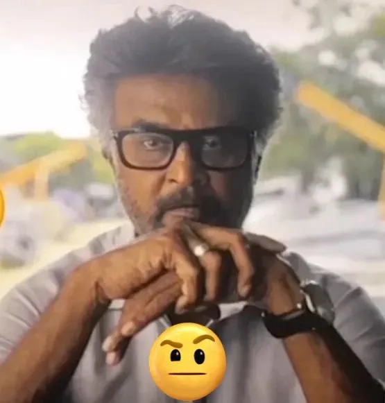 Rajinikanth raising an eyebrow with an intense questioning glare