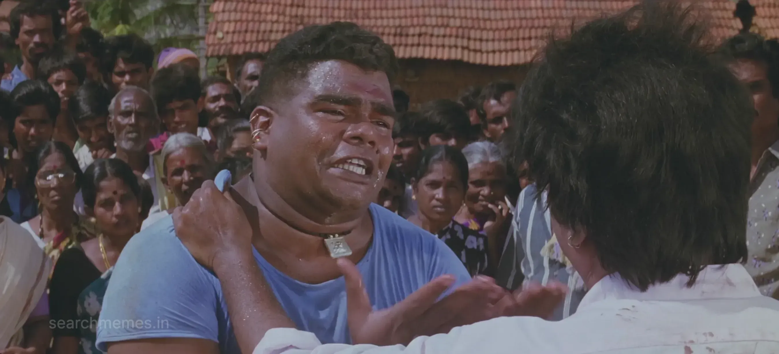 Sweating Kalabhavan Mani frantically gesturing while confronting Rajinikanth in Muthu