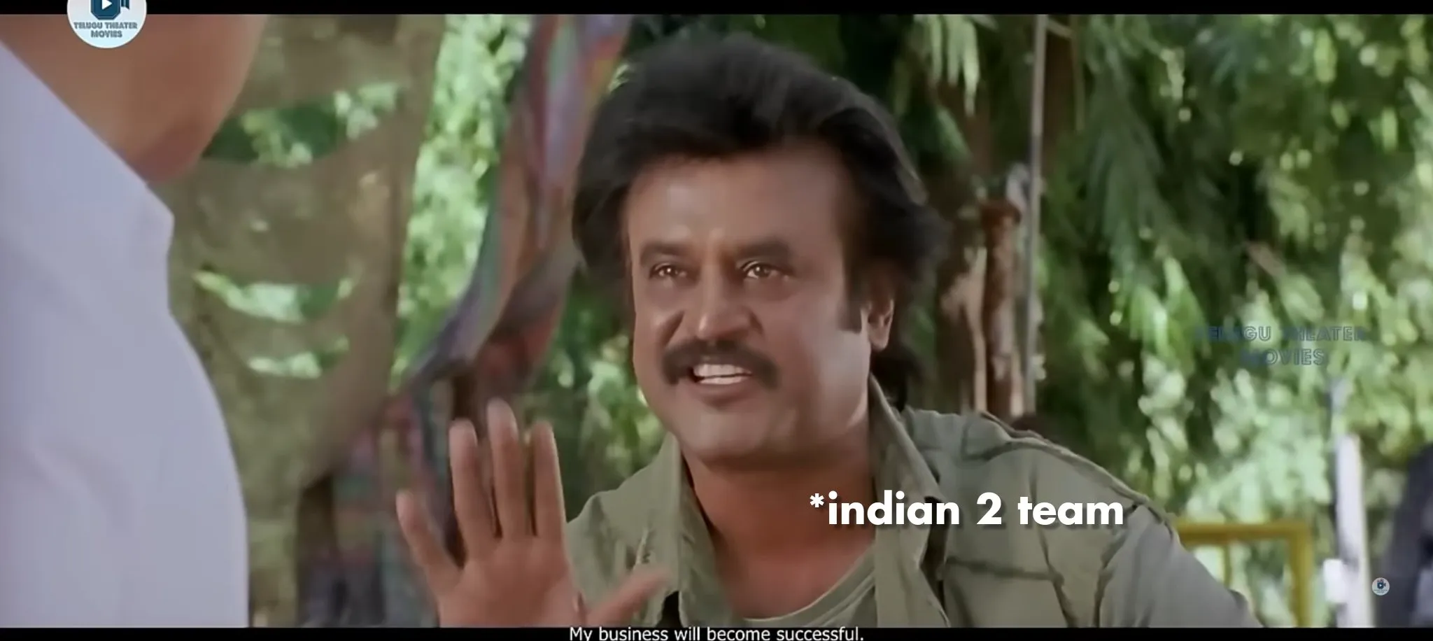 Rajinikanth in sunglasses holding a glass of tea while speaking with swagger