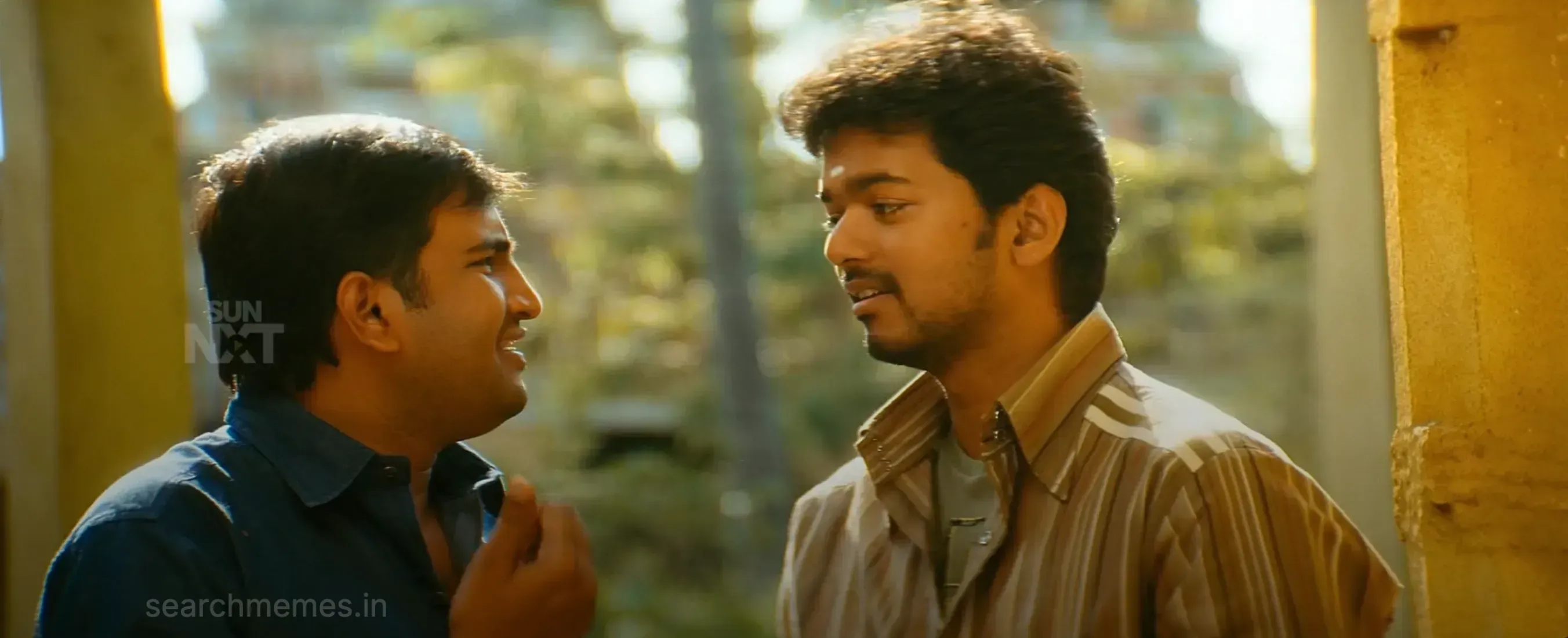 Santhanam talking earnestly to Vijay in Azhagiya Tamil Magan