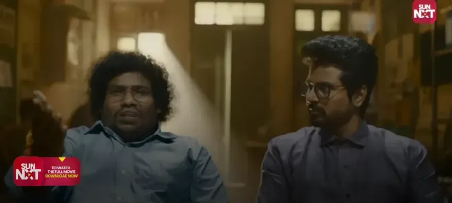 Yogi Babu looking astonished and gesturing outward with indignation
