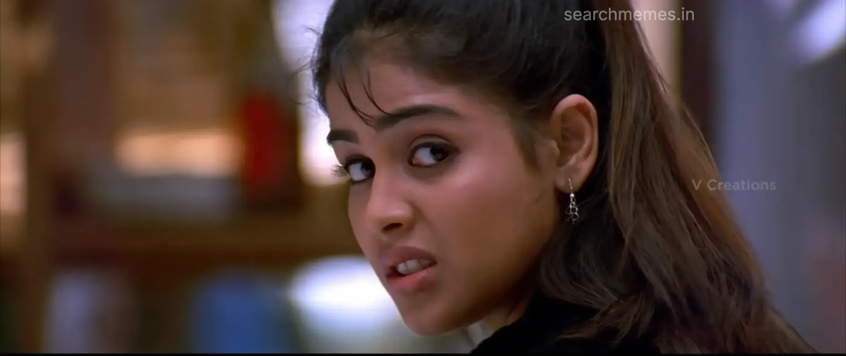Genelia from Sachein with a disgusted expression on her face.