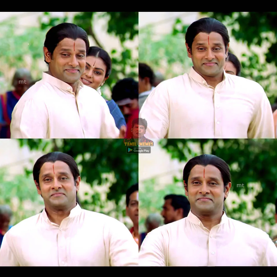 Vikram with sacred ash on his forehead smiling proudly as he walks outdoors
