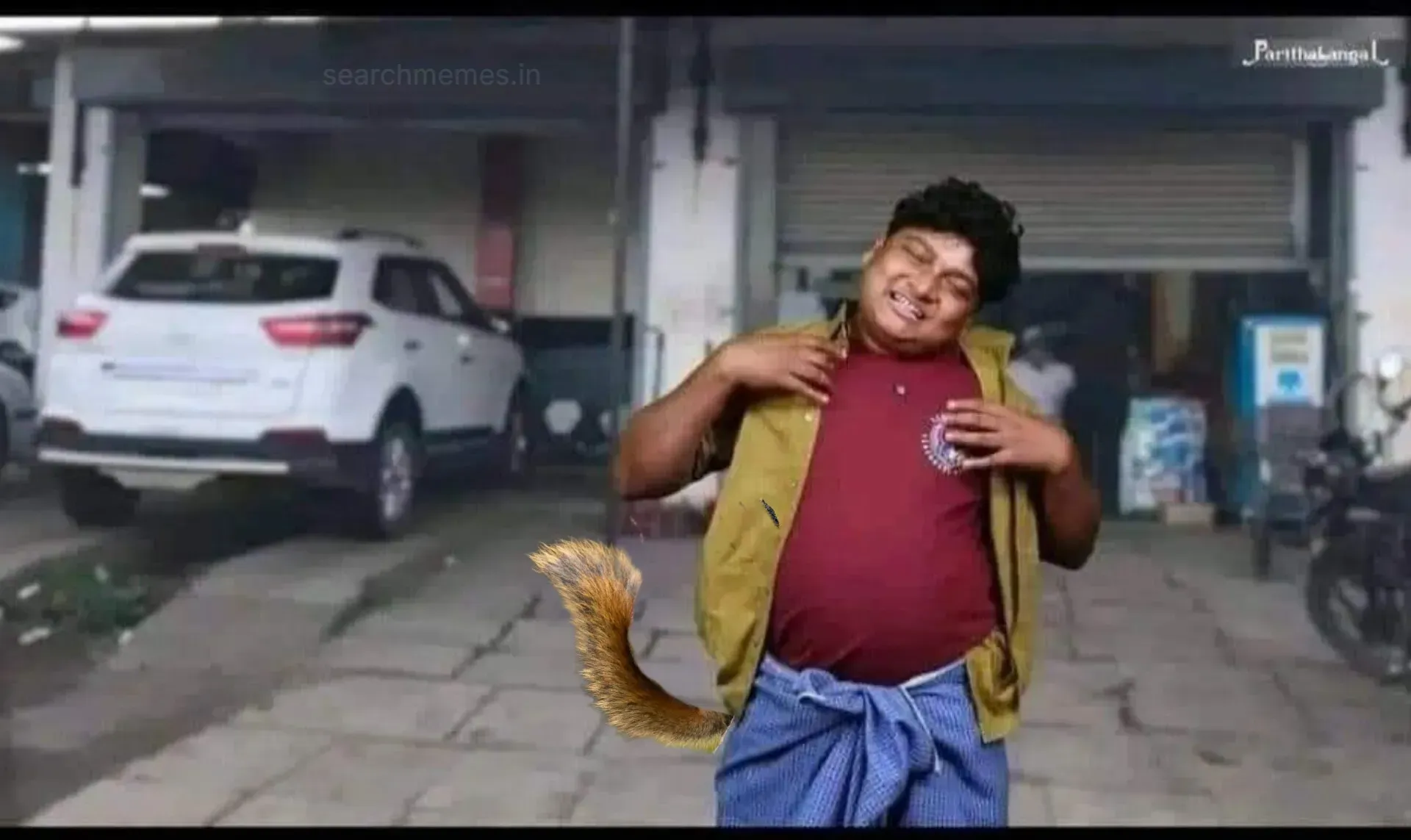 Gopi posing humorously on a street with an edited squirrel tail