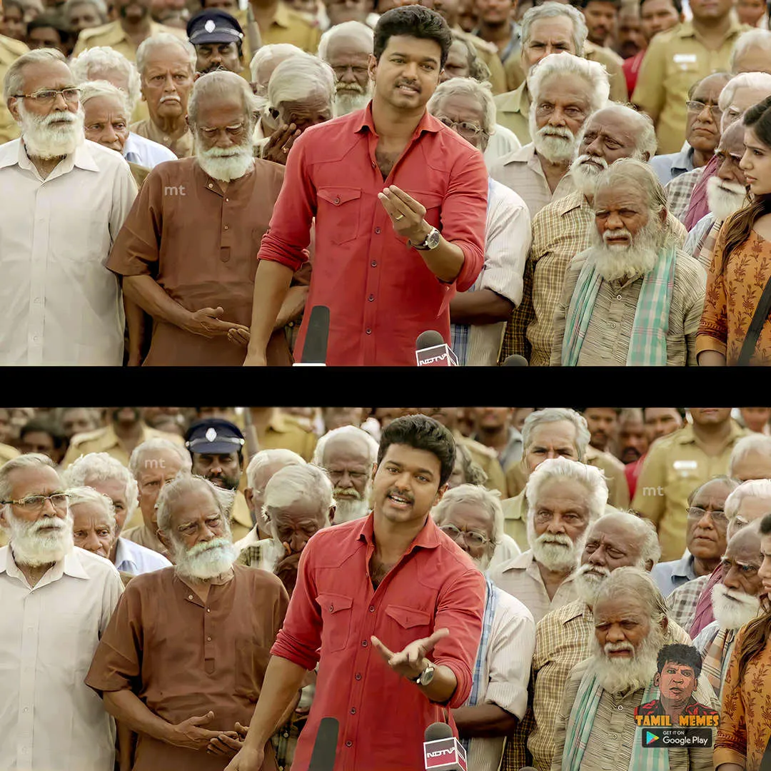 Vijay speaking passionately into multiple media microphones at a briefing
