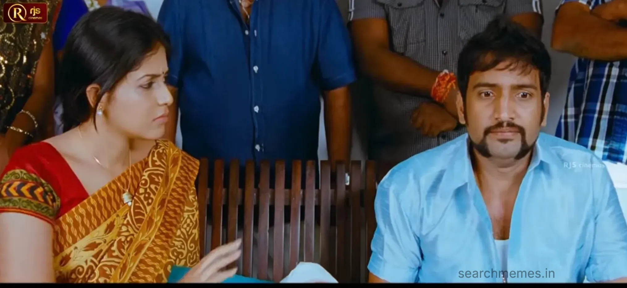 Anjali firmly talking back while Santhanam looks disappointed and awkward