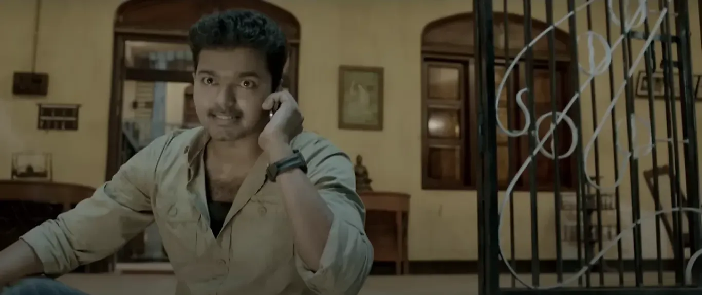 Vijay looking ahead with an intense steely gaze and composed swagger