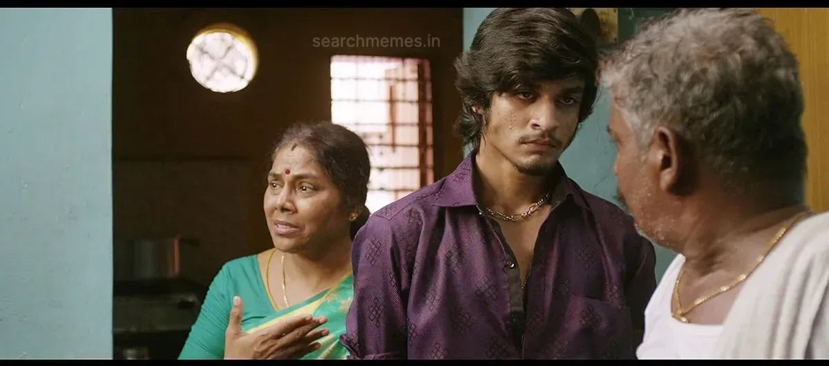 Saran Shakthi glaring fiercely with folded arms in Vada Chennai