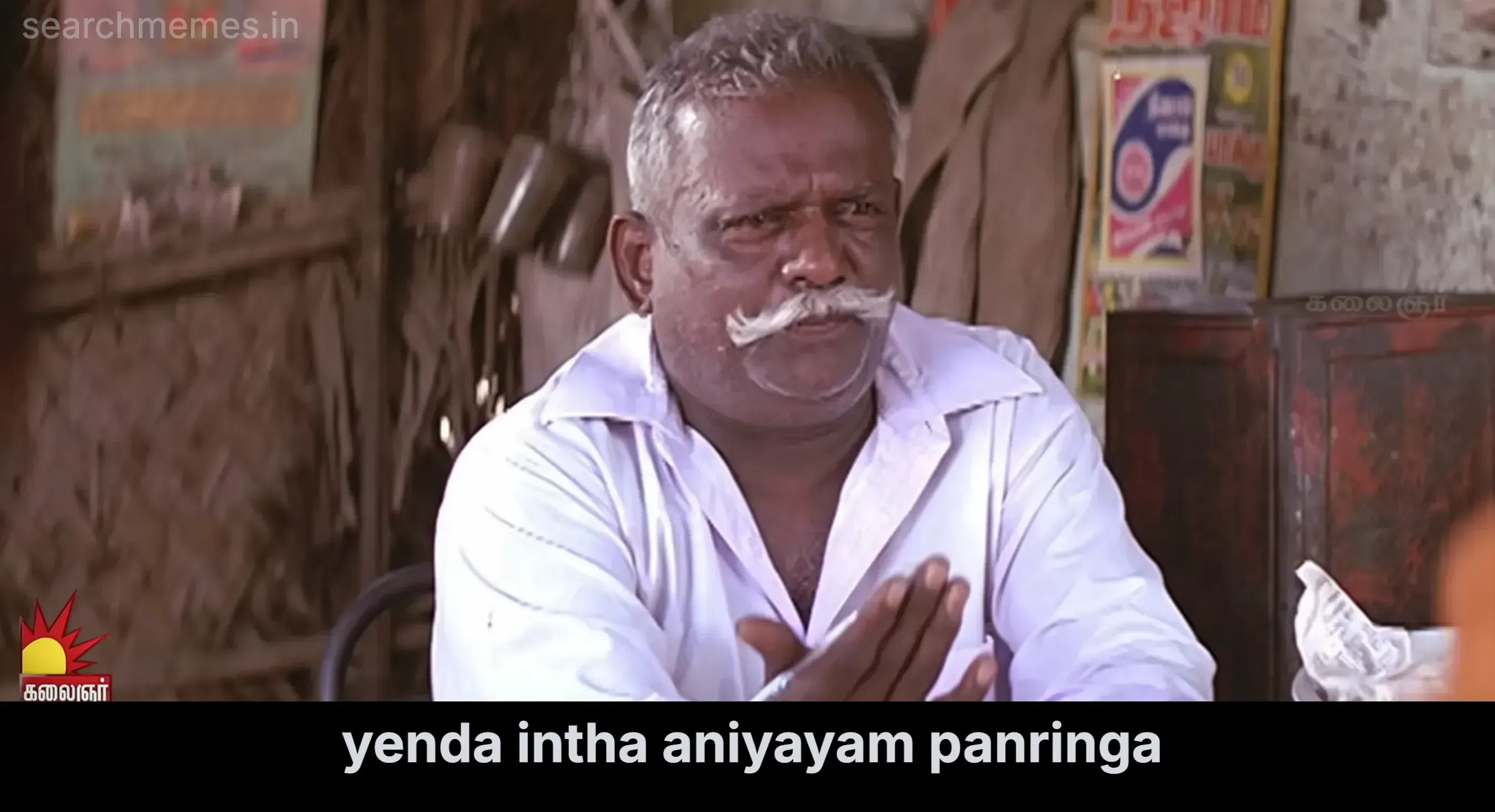Saravanan with folded hands asking why this unfairness is happening in a village tea stall