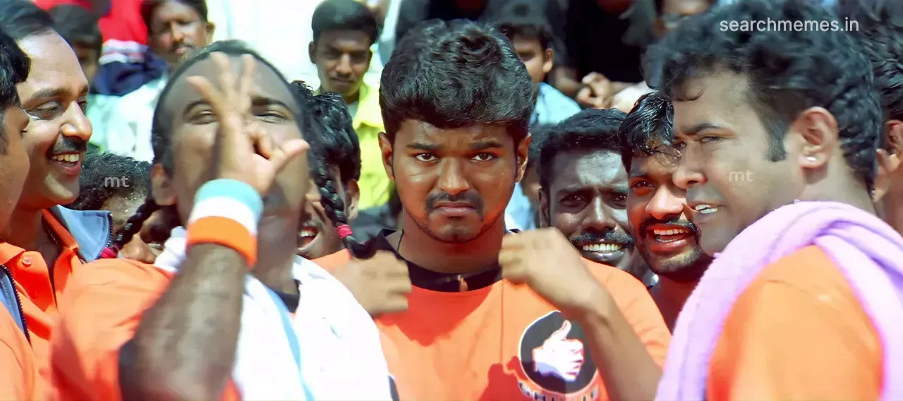 Vijay in orange sports jersey walking into tournament court
