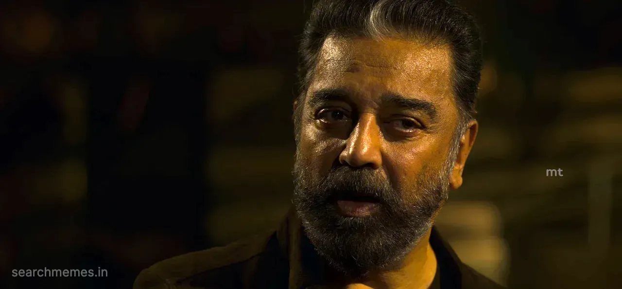 Kamal Haasan with a serious, angry expression, looking determined.
