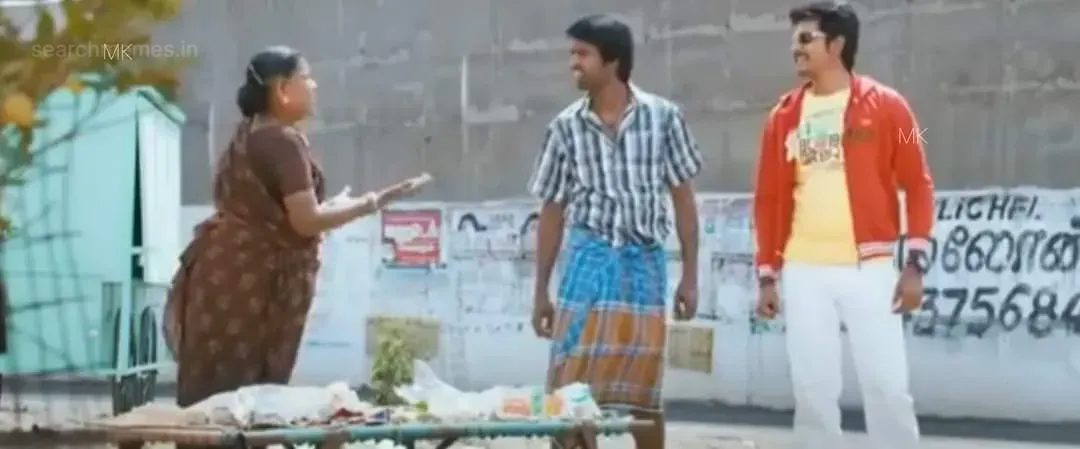 Sivakarthikeyan and Soori listening innocently to a street vendor