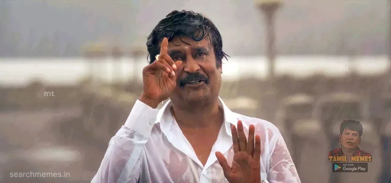 Rajinikanth in a wet white shirt looking upward and gesturing towards the sky with gratitude