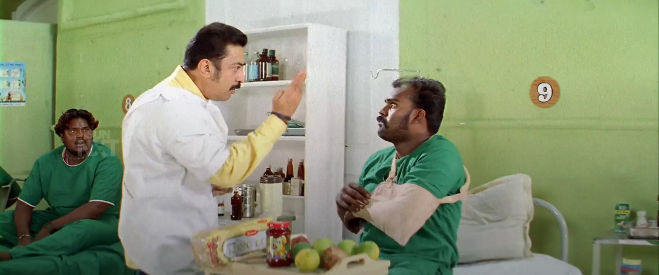 Kamal Haasan delivering a sarcastic critique with mocking facial gestures