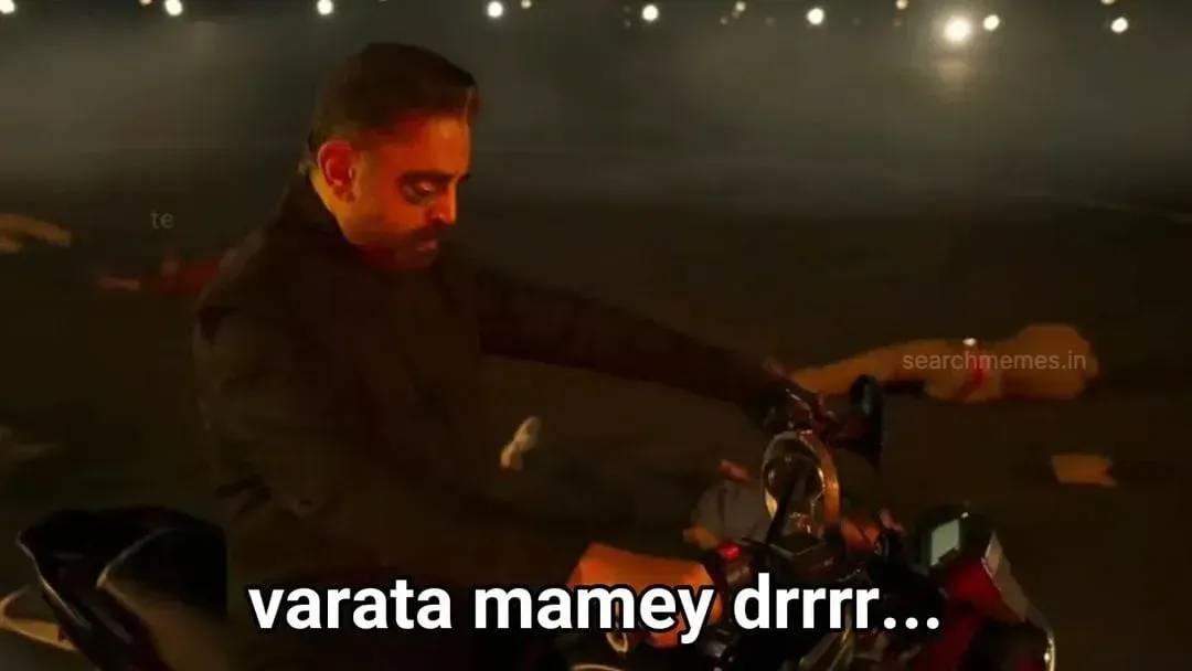 Kamal Haasan seated on a bike with subtitle saying goodbye and driving off