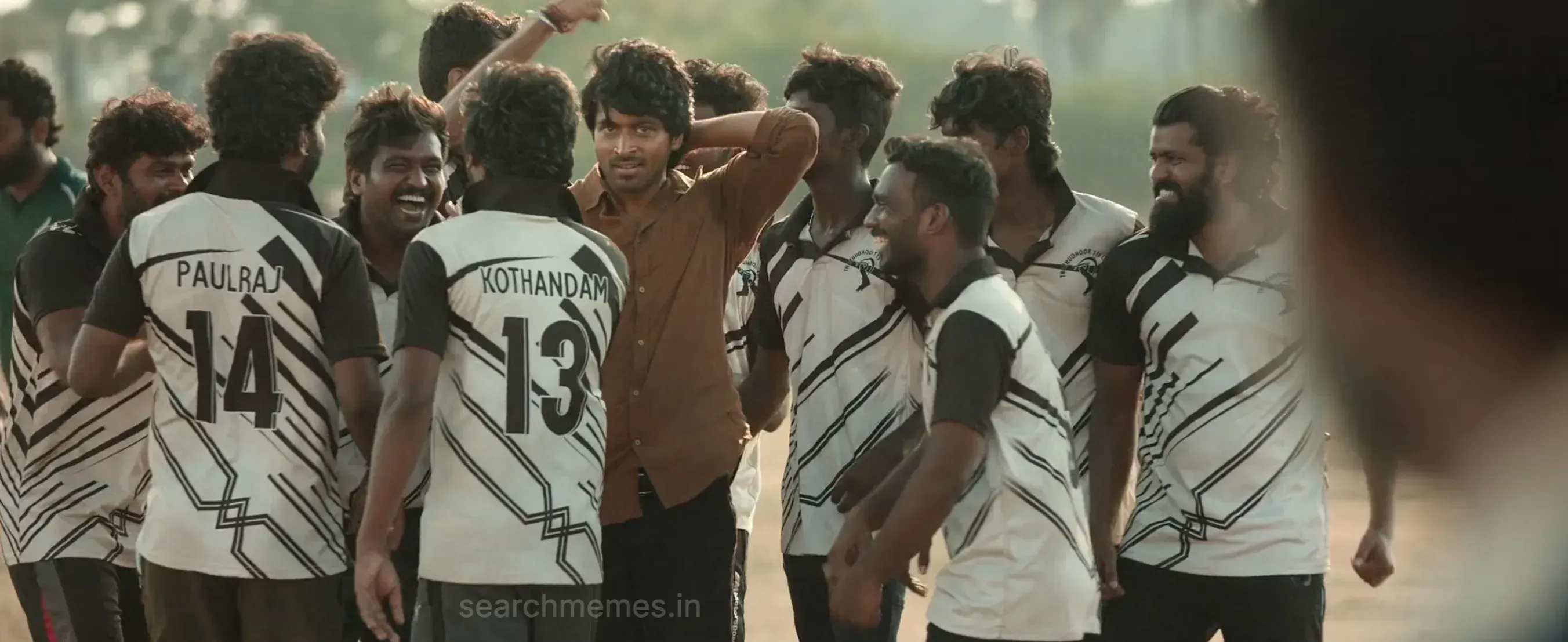 Harish Kalyan celebrating passionately on a dusty cricket pitch