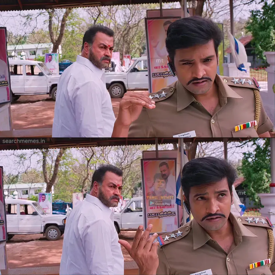 Santhanam in police uniform gesturing with his hand while a politician watches in the background