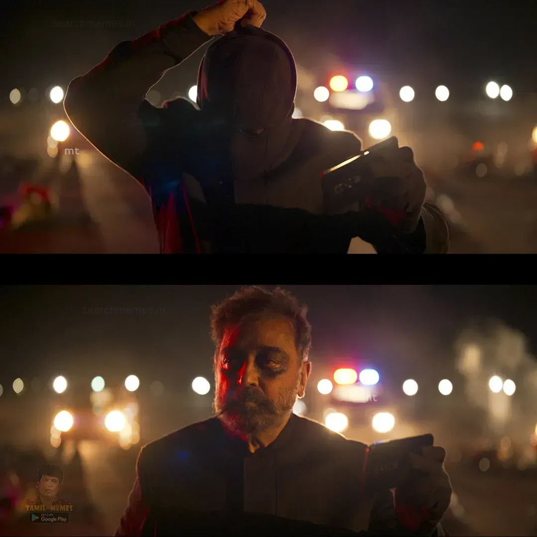 Kamal Haasan removing his face mask with flashing police lights behind him