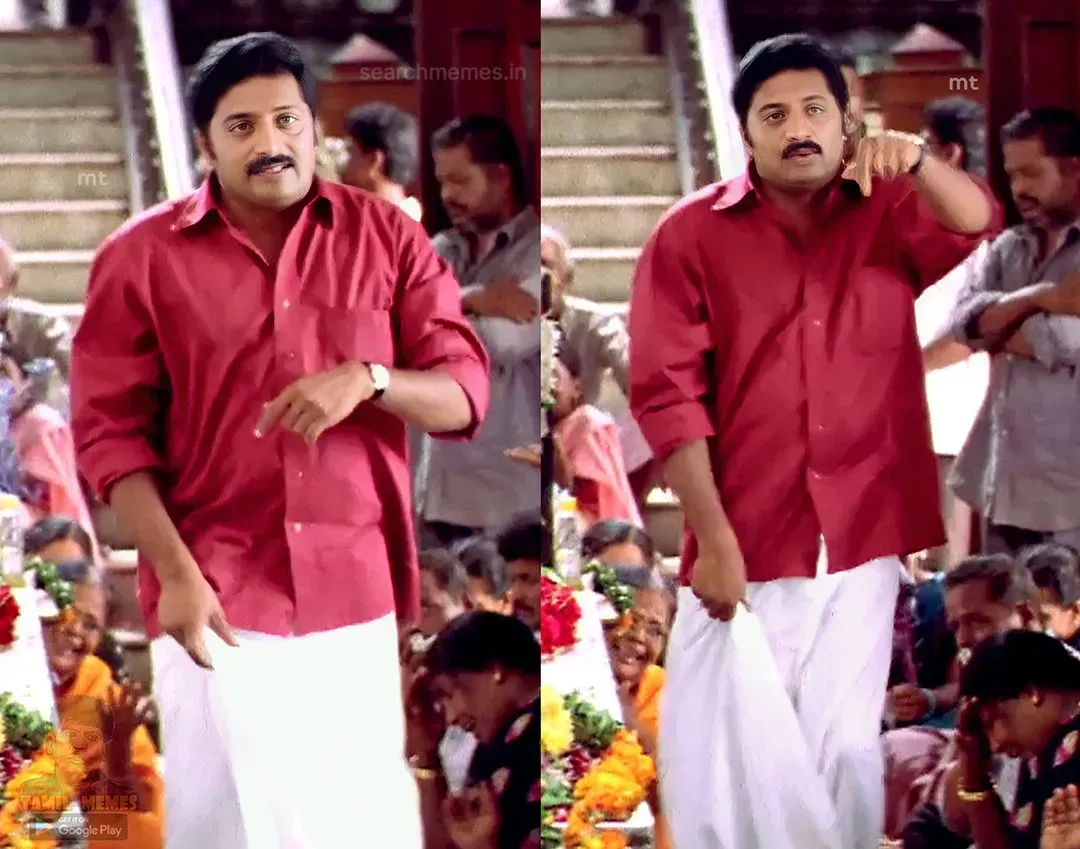 Prakash Raj lifting his white dhoti and gesturing in a crowd in Anniyan