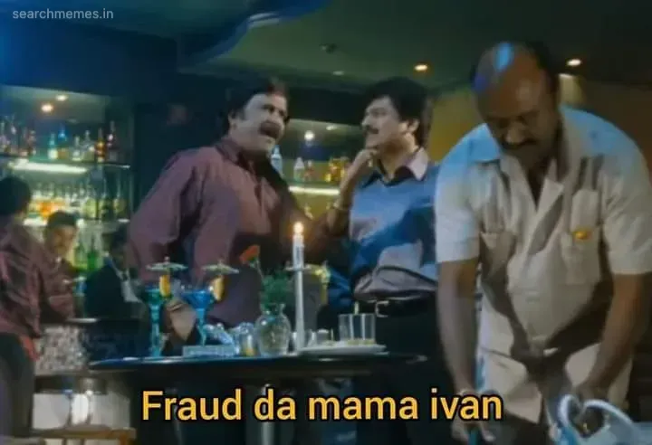 Rajinikanth whispering suspiciously to Vivek in a restaurant while pointing at a waiter