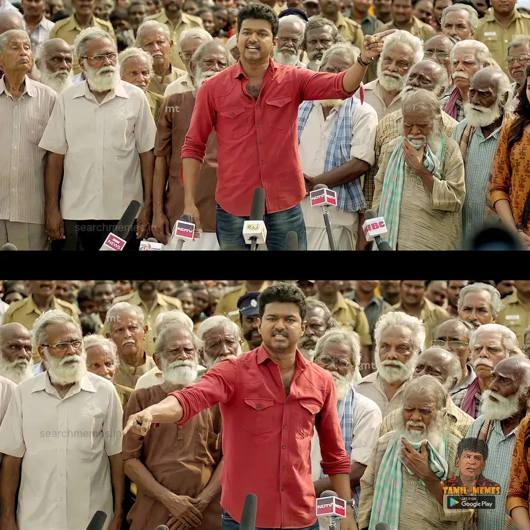 Vijay in a red shirt speaking firmly behind press microphones surrounded by village elders