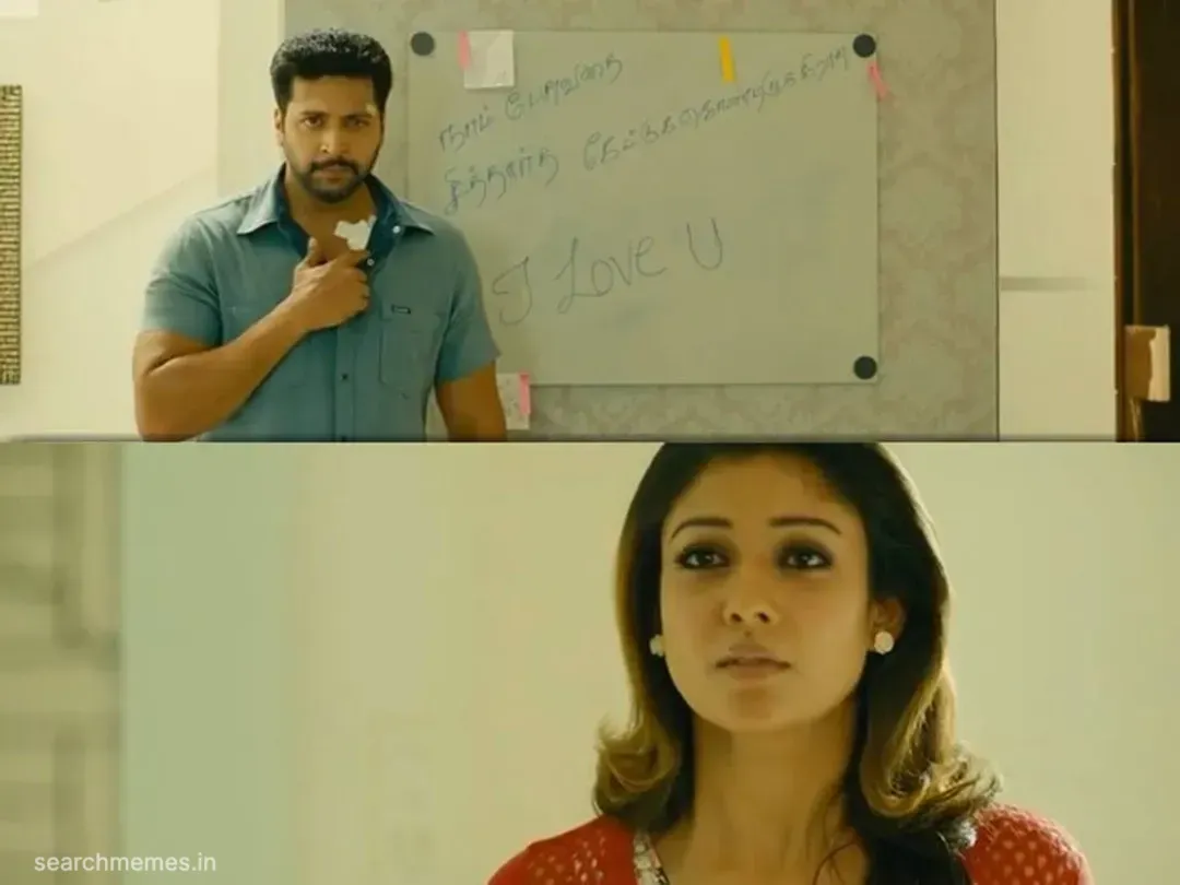 Jayam Ravi writing on a whiteboard with a marker alongside Nayanthara