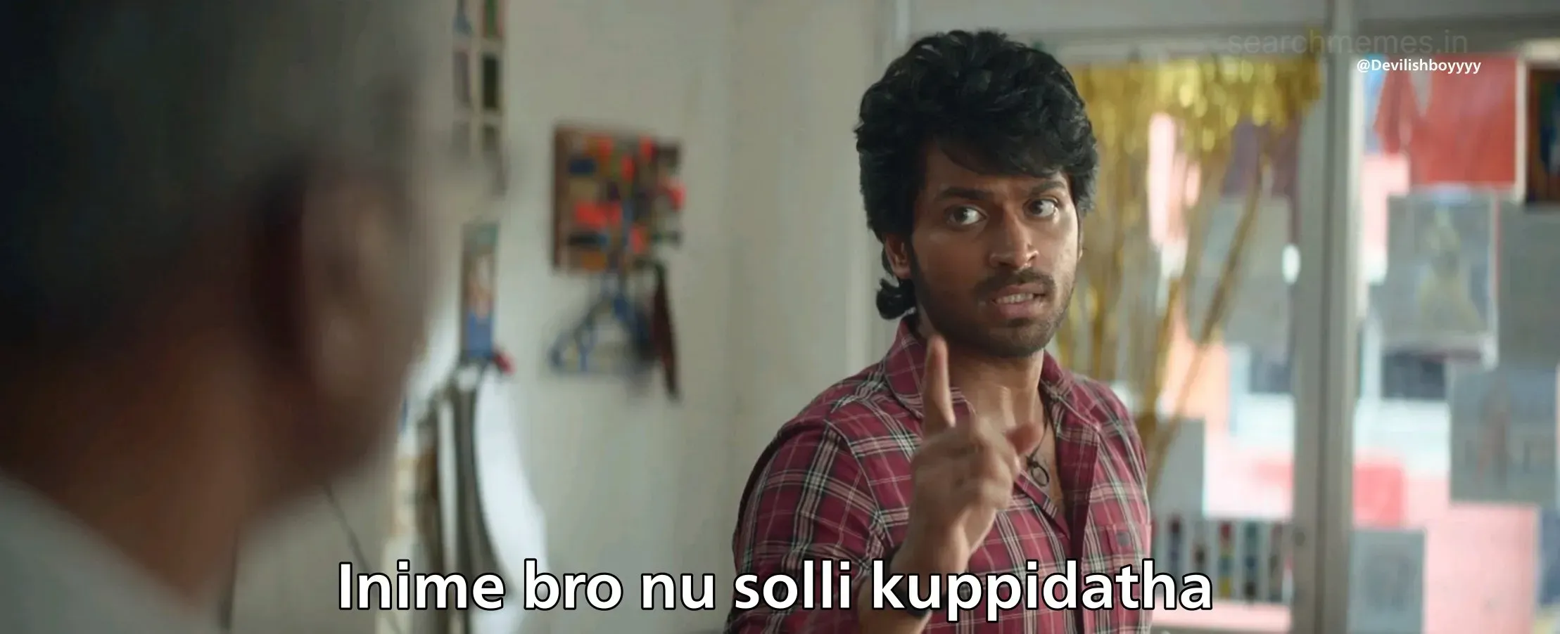 Harish Kalyan pointing his finger sternly in an annoyed expression