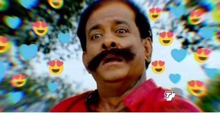 Singamuthu looking stunned surrounded by floating heart emojis